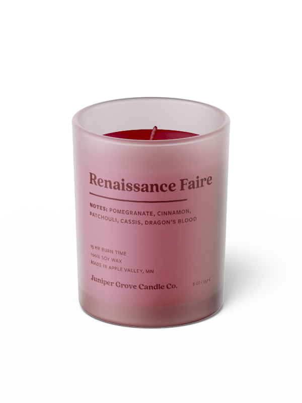 red renaissance faire scented candle in a glass jar